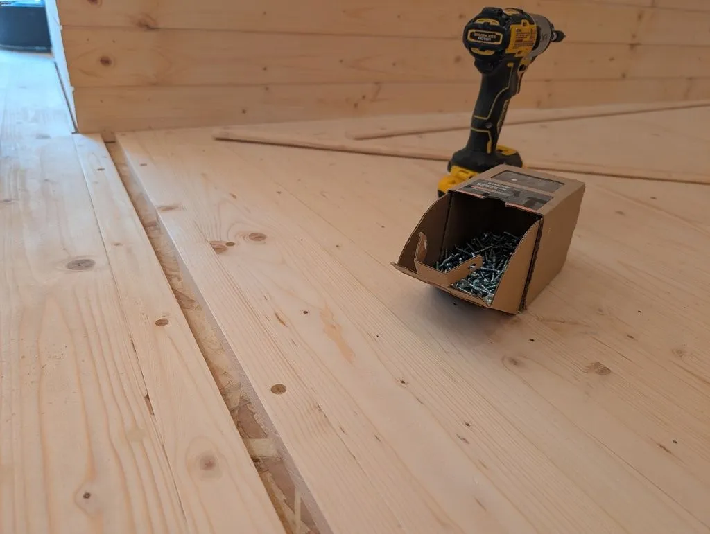The expansion gap between the main living space and sleeping nook, which we would cover with a threshold.