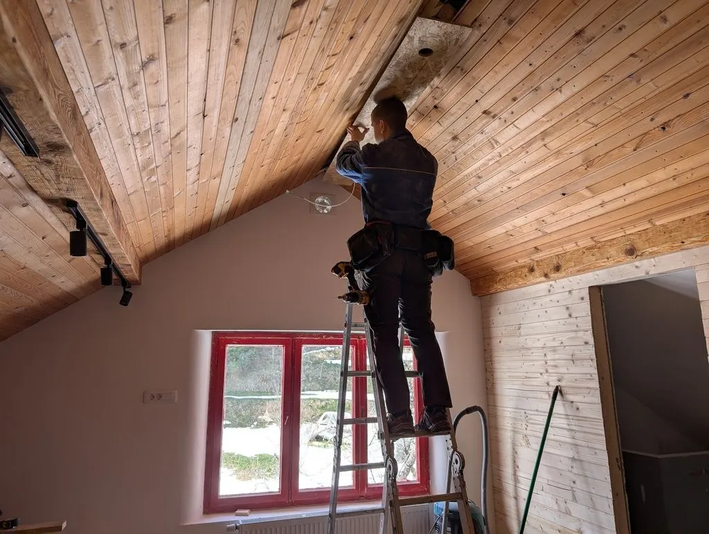 Test-fitting the OSB soffit that creates the cavity at the ridge into which we will recess the lights.