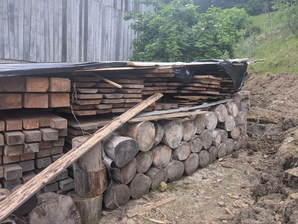 Our stack of lumber (mostly spruce—the dominant construction softwood in Slovenia and much of Central Europe), from which we made the door jambs. The jambs are made from nominally 50 mm boards, which were jointed and then planed to 40 mm.