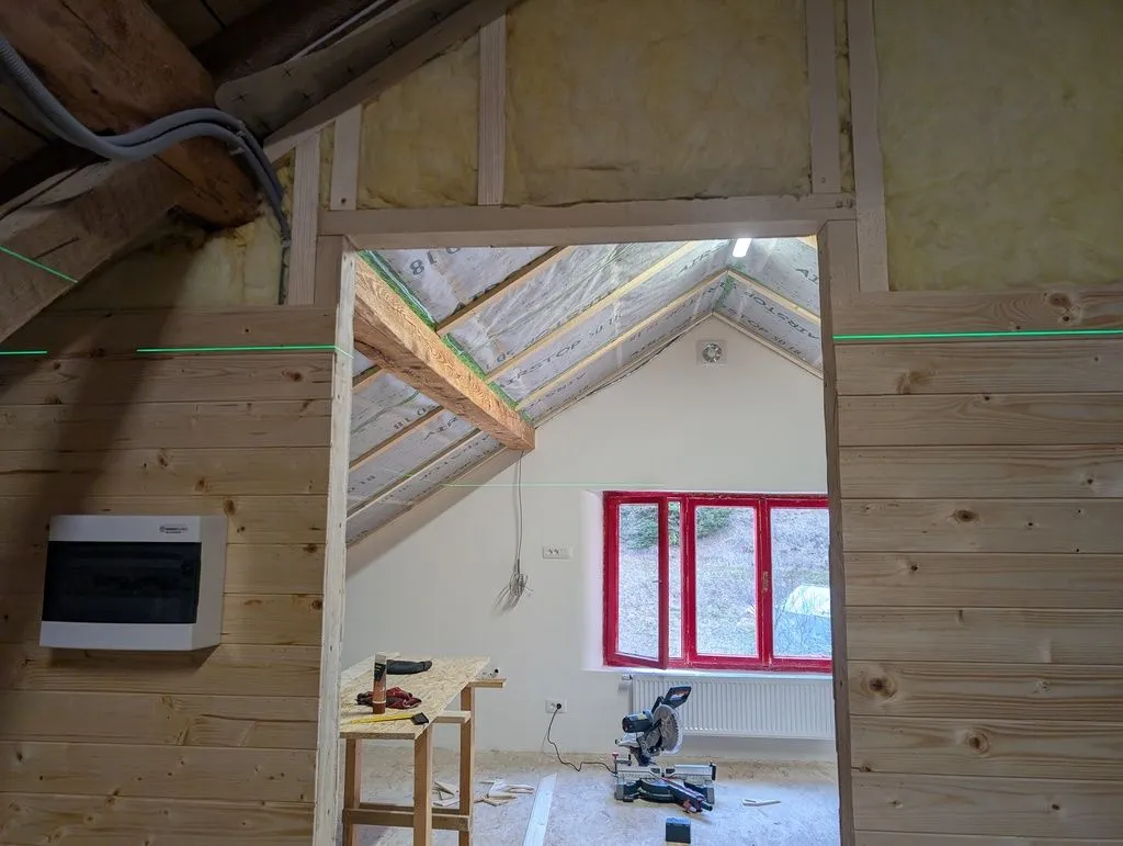 We used a laser level to ensure the boards were aligned on either side of the doorway.