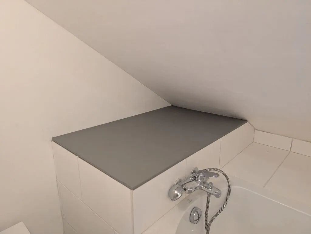 The installed shelf over the utility area. I'll tile it at some point...