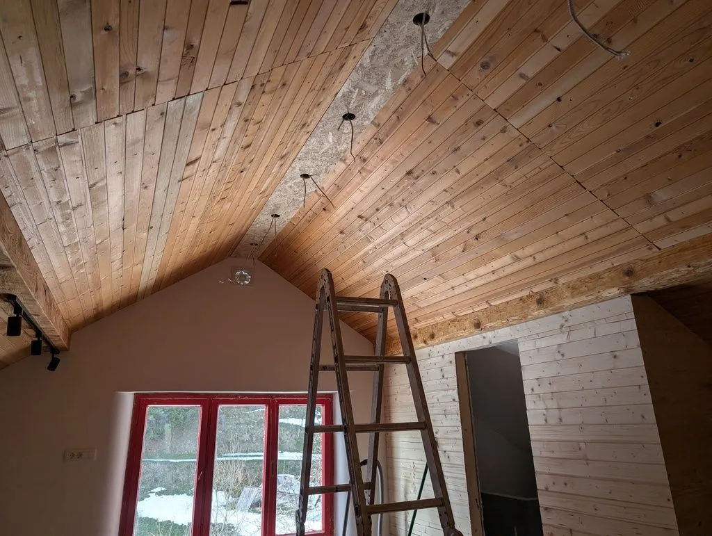 Completed cabling, with stub-outs protruding from the light holes, ready to supply the lights.