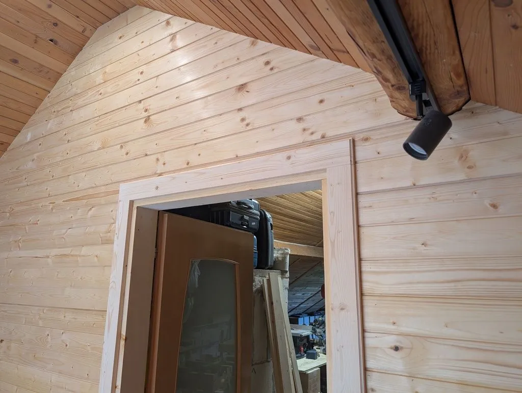 The installed casing on the inside of the main entry door. Similar casings are installed on the exterior side, and on the bathroom door.