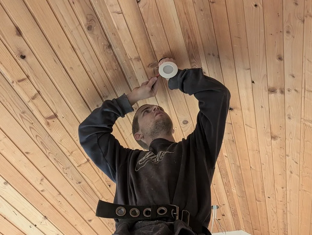 Wiring the recessed lights.