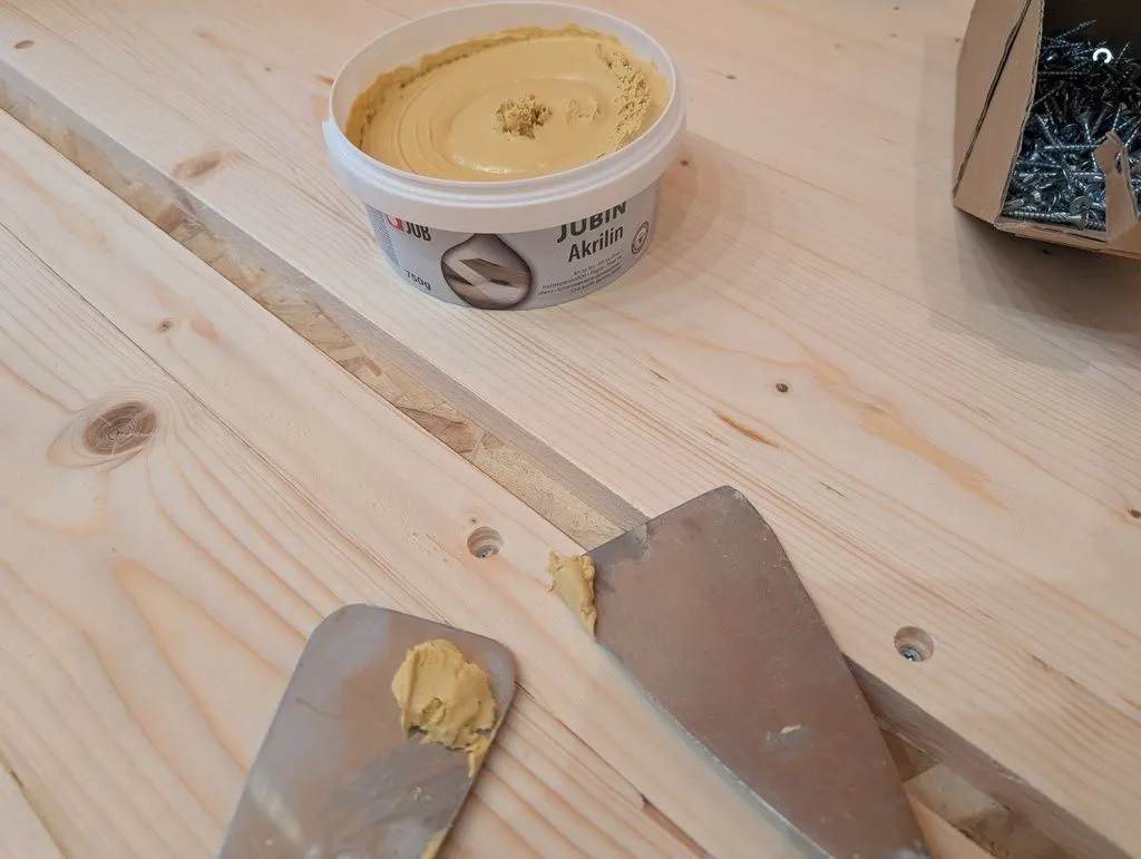 We filled screw holes with Akrilin, a flexible acrylic wood filler made by the Slovenian company JUB.