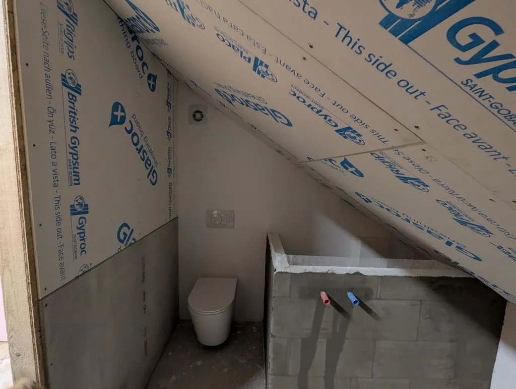 The completed drywall/cement board installation.