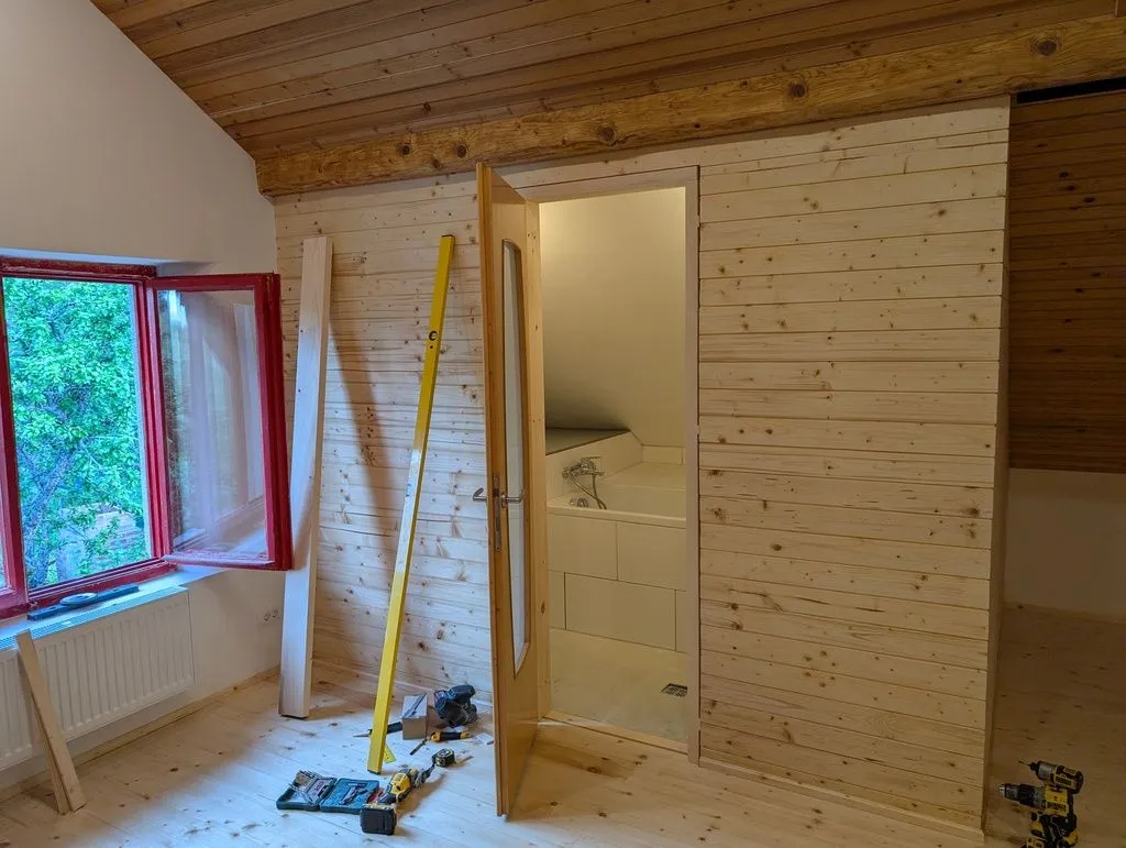 Testing the door operation after hanging the door.