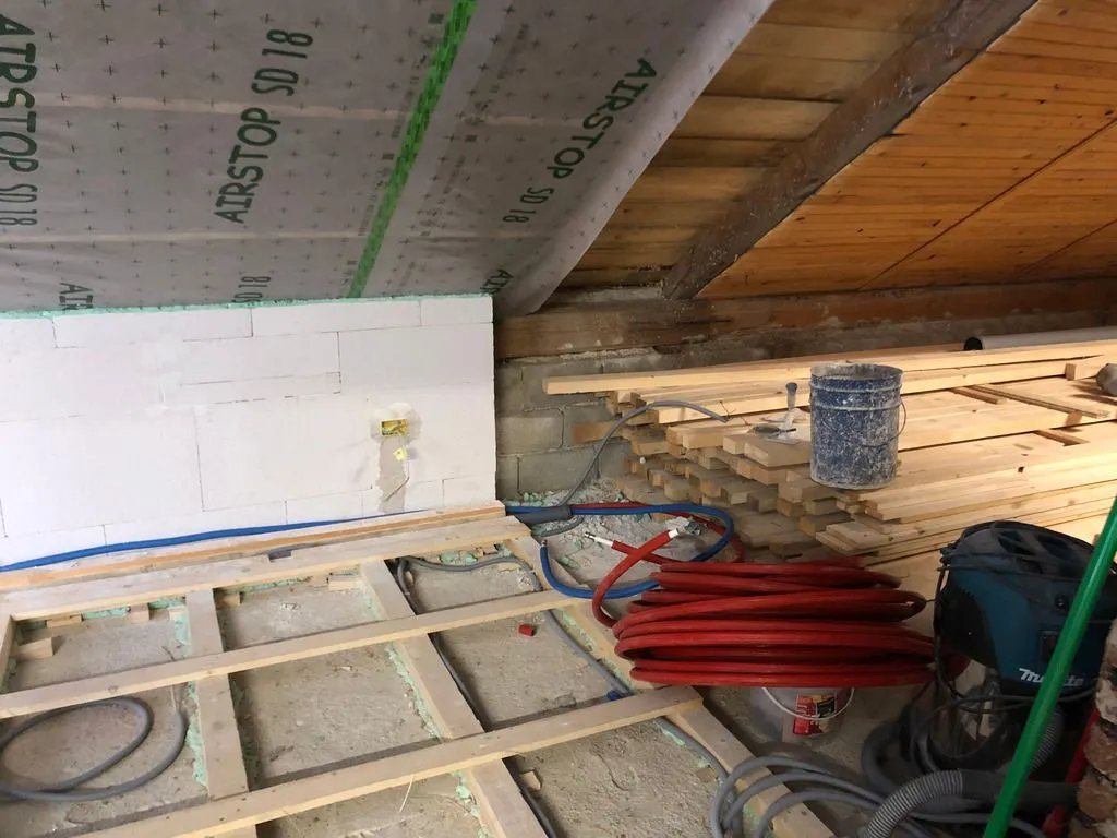 Supply lines (made of Aluplast, similar to the PEX used in the USA) come in large coils, conveniently coming in both a red and blue color to indicate hot and cold lines.
