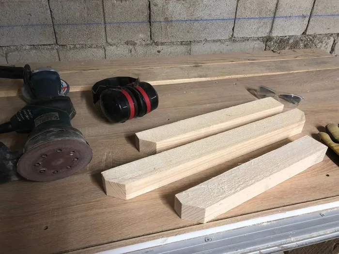 Ledgers laying on the workbench, cut to length but unfinished