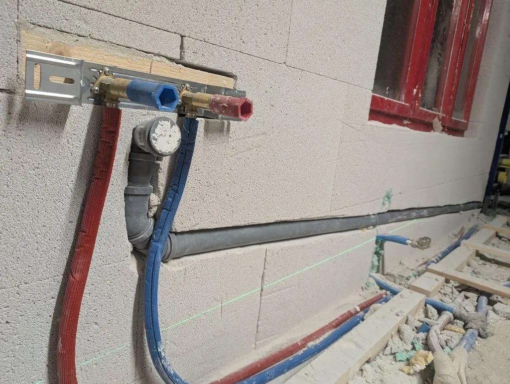Details around the plumbing installation for the kitchenette.
