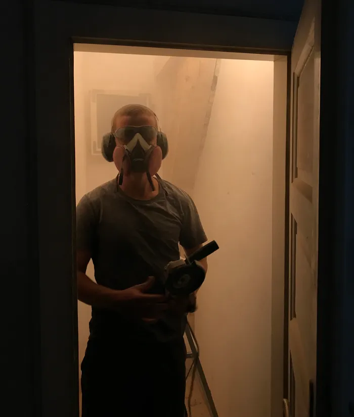 The fire-retardant high-impact polystyrene junction box replacing the original makeshift wooden box.