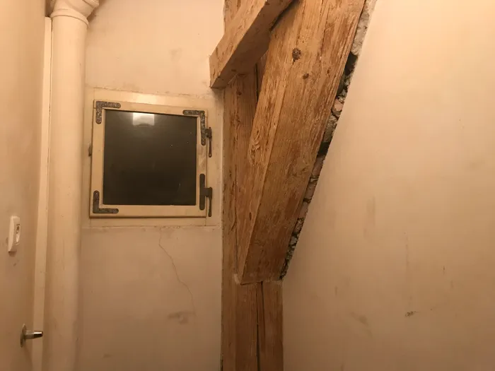 The timbers after grinding off the remaining plaster, then sanding with a random orbit sander.